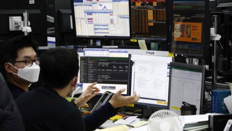 Asian shares mixed ahead of Fed rate decision