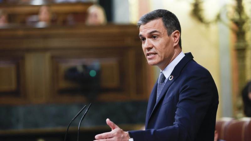 Spain to impose temporary taxes on banks, power firms