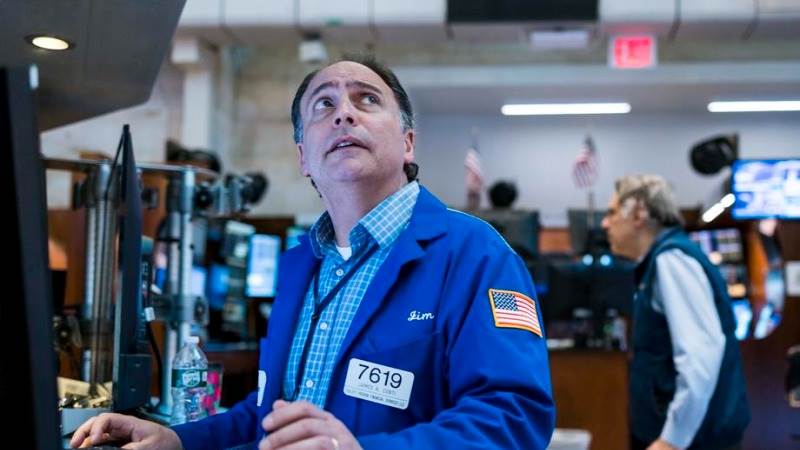 Wall Street ends higher after Fed rate hike