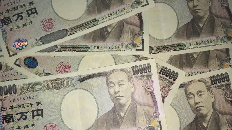 Dollar strengthens against yen to fresh 1998 high