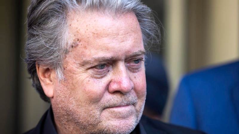 Trump’s ex-aide Bannon surrenders to prosecutors