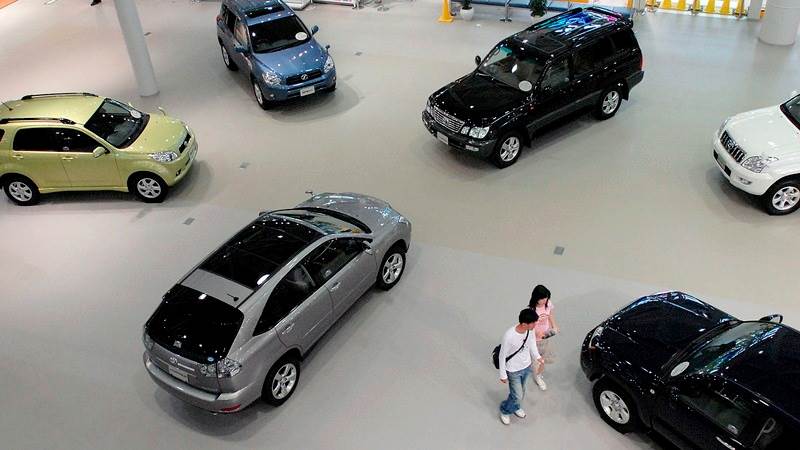 Japanese carmakers to pay telecom patent fees – report