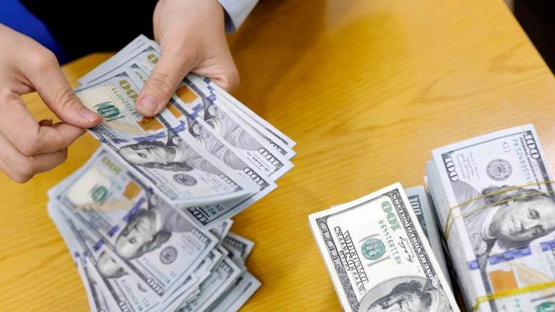 Dollar soars on Fed rate decision