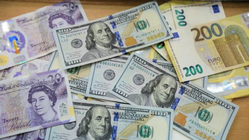 Dollar down 1.5% against pound, euro after BoE move