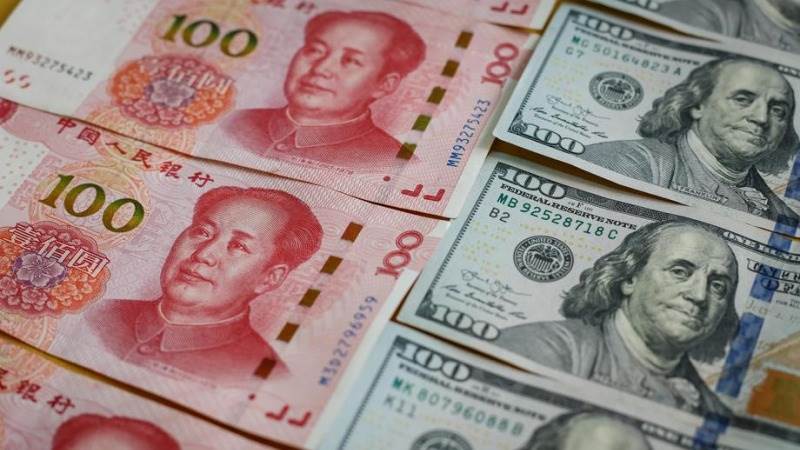 Chinese state-run banks selling dollars – report