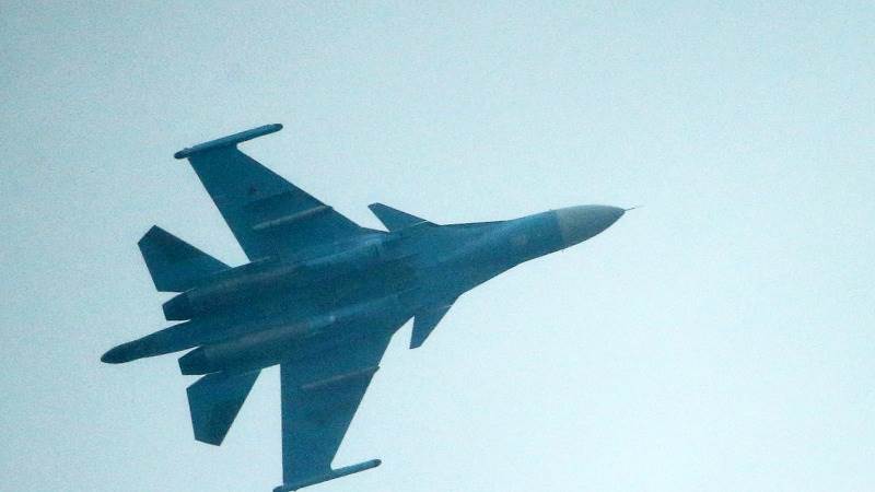 Russian fighter jet crashes into apartment building