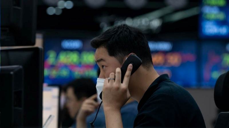 Asian stocks mixed amid earnings