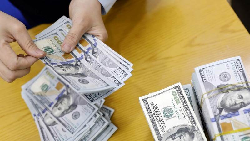 Dollar firmer as economic woes spread