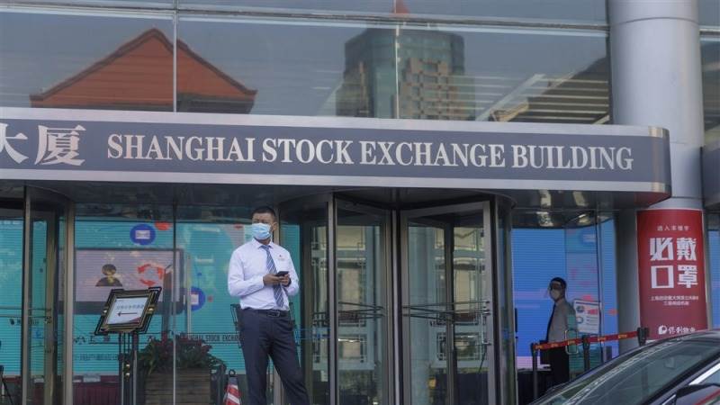 China stocks down as protests continue