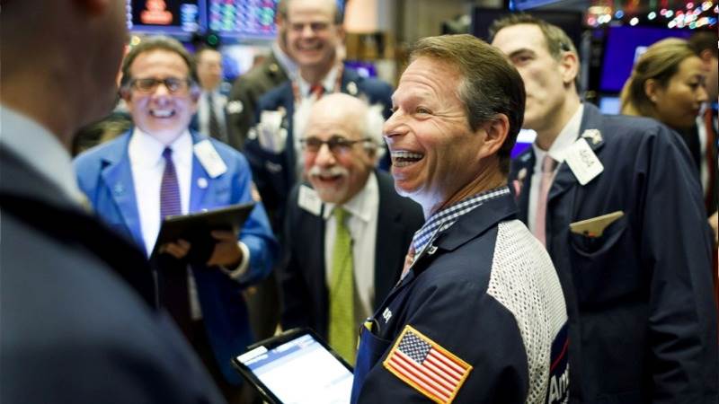 Dow soars 700 points at close on Powell’s remarks