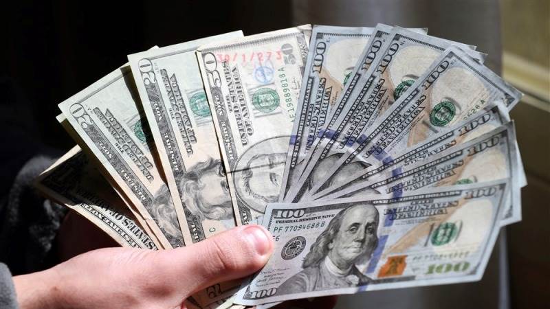 Dollar down to June lows after US inflation figures