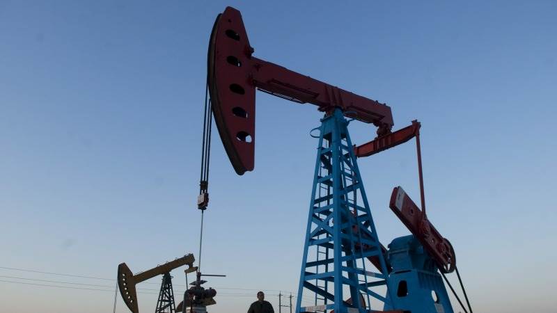 Oil prices down over 1% as demand woes mount