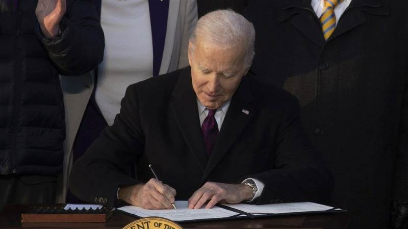 Biden inks $1.7 trillion government spending bill