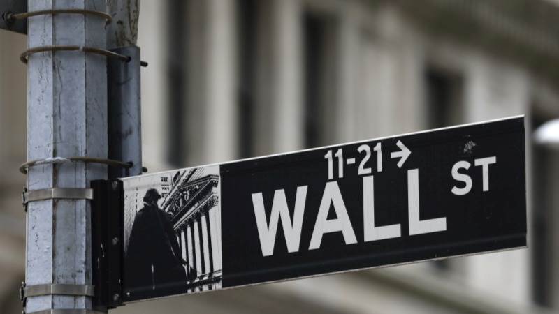 US closes mostly lower on big companies’ losses