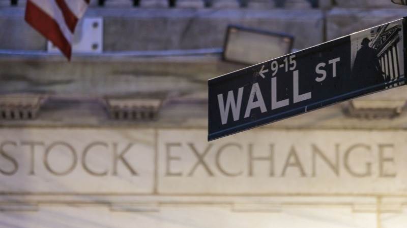 Wall Street pares gains in premarket on employment data