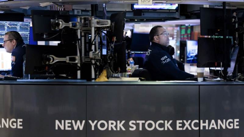 Wall Street wraps up higher after earnings, data