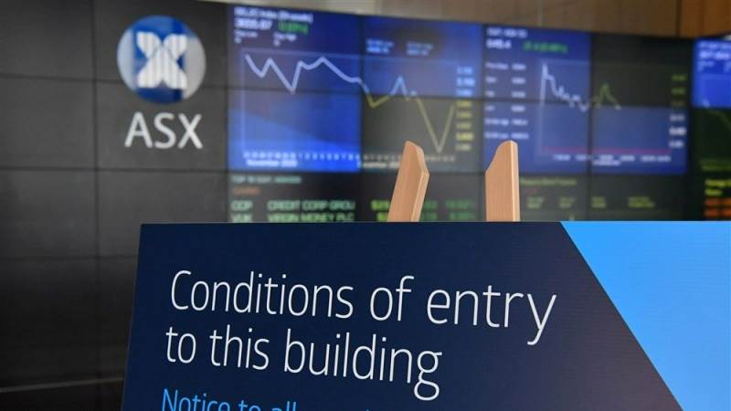 Asian markets trade mixed as Australia hikes rates