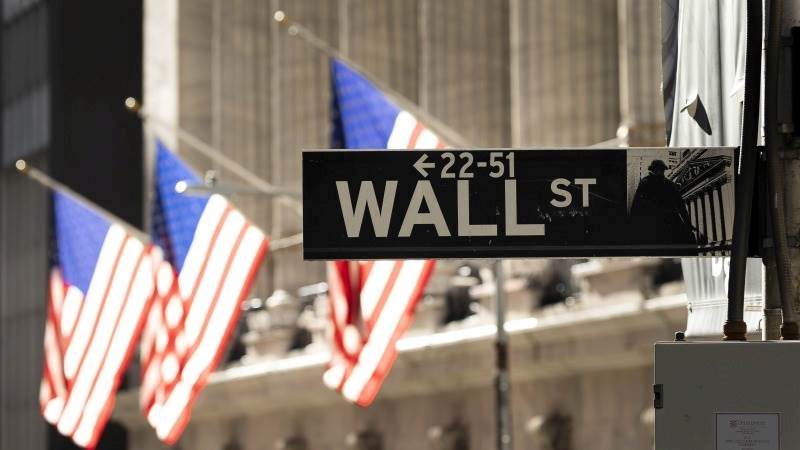 US markets lower amid economic data, Fed’s Powell