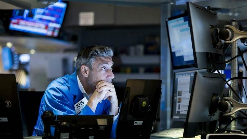 US opens lower as traders scan policy indicators