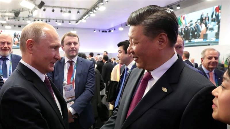 Putin hails relations between Russia and China