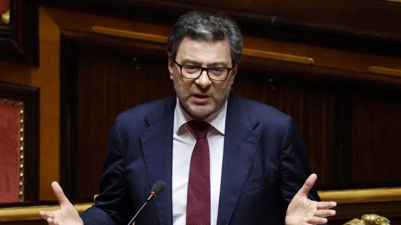 Italy’s economy minister urges caution in China ties