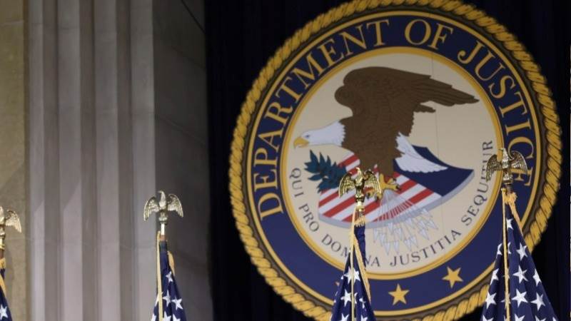 DoJ charges US, Russian citizens over election interference