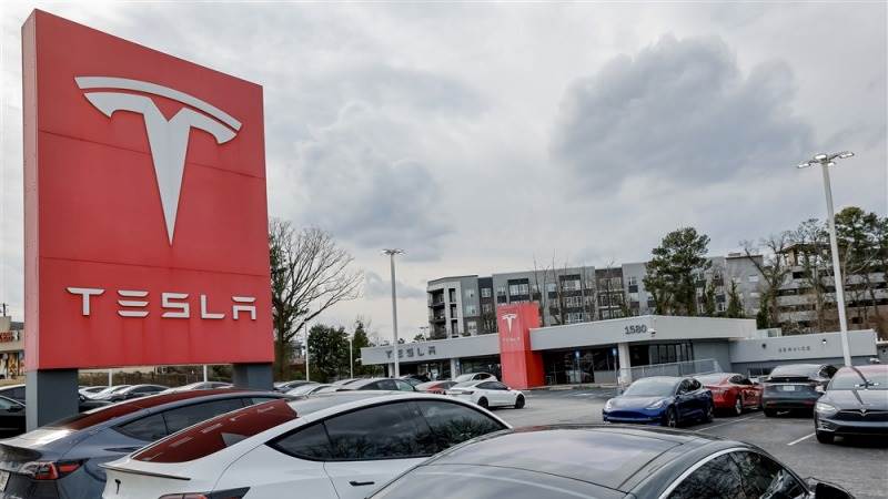 Tesla cuts price of 3 electric cars