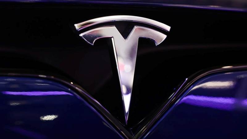 Tesla’s net income tumbles 24% to $2.51 billion in Q1