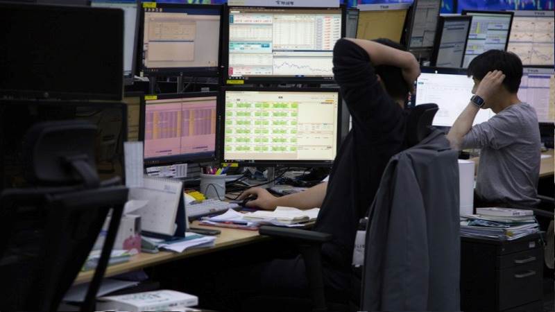 Asia trades lower with focus on RBA decision, US debt limit