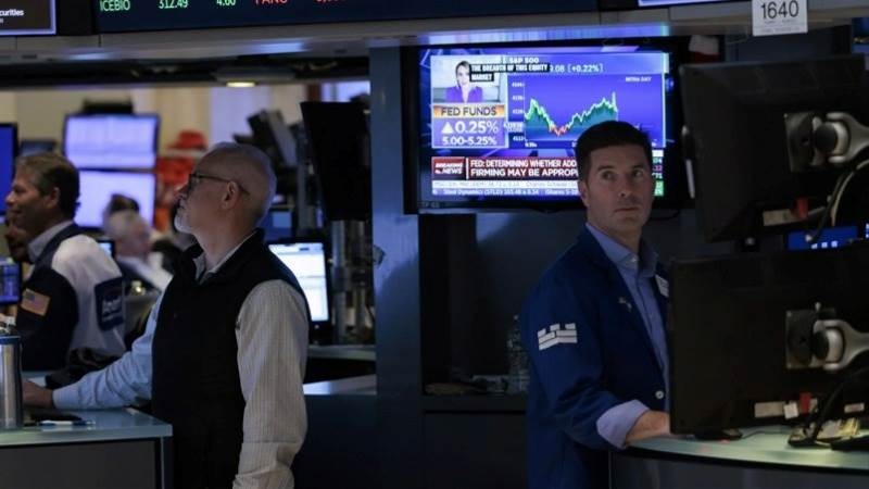 US opens with losses as markets await key data