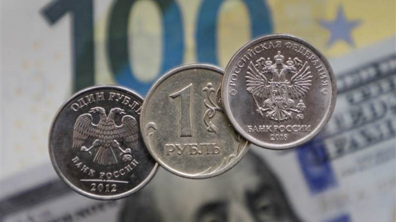 Russian rouble tumbles amid armed uprising