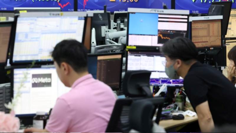 Asian stocks muted ahead of RBA rate decision