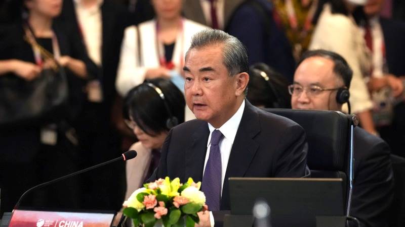 Wang Yi: US should meet China halfway