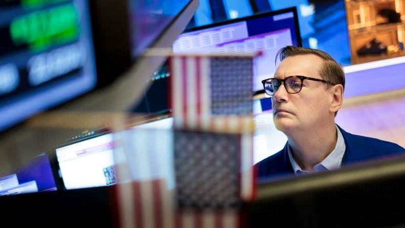 US markets close mixed as investors digest Powell’s remarks