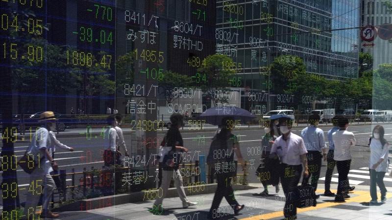 Asia trades mostly down ahead of US, China inflation data