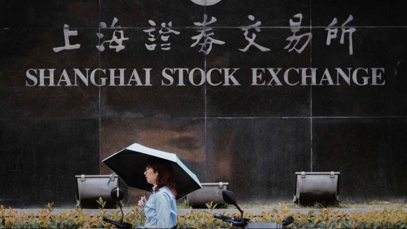 Asia mostly lower amid data releases