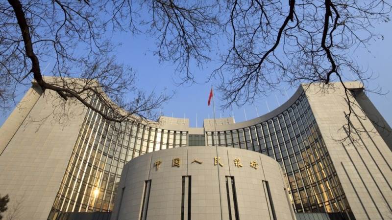 China’s central bank holds benchmark rates