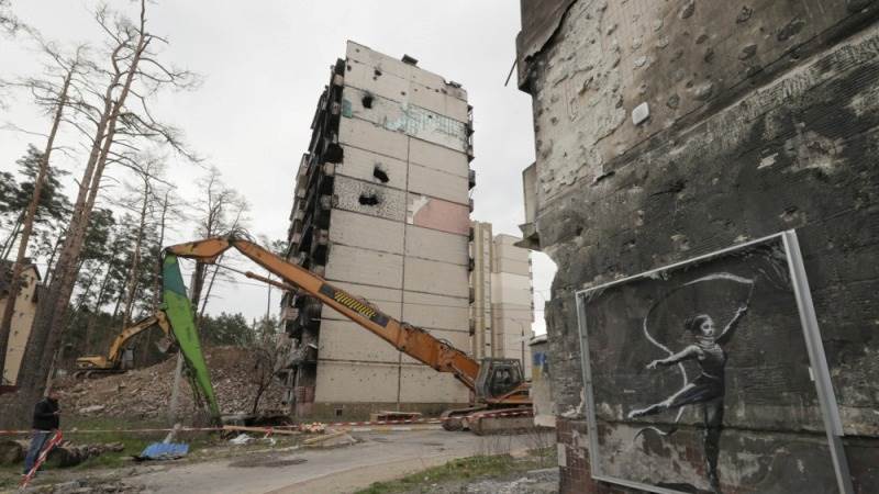 Russia says Ukrainian shell hit building in Donetsk