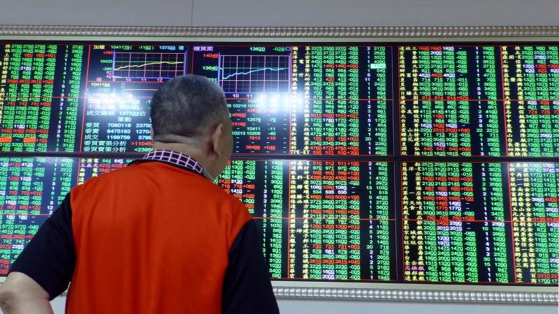 Asia trades lower as property crisis persists