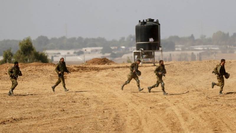 Israeli military says it conducted raids in Gaza