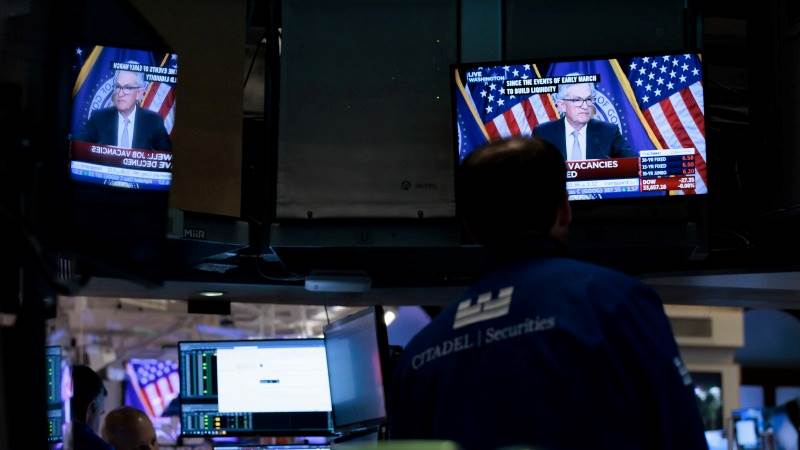 Dow drops 200 pts after Powell’s remarks