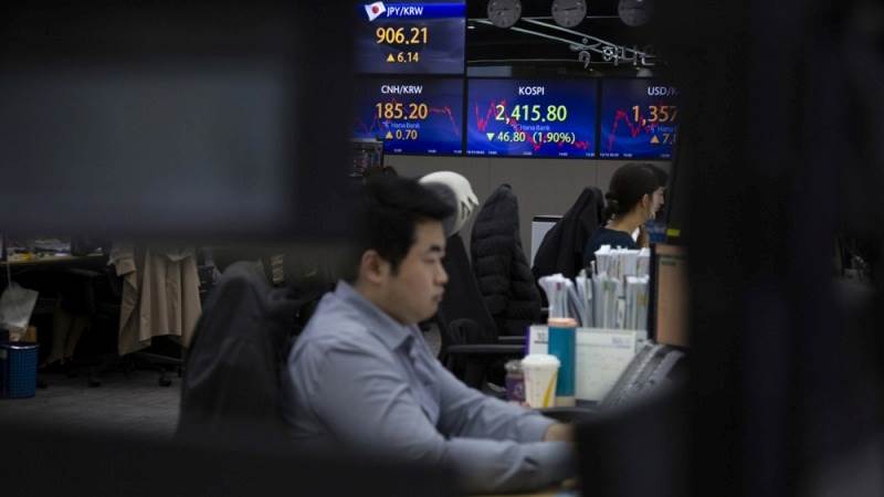 Asia trades mixed amid earnings releases