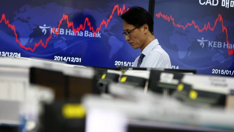 Asia mostly lower after major earnings reports