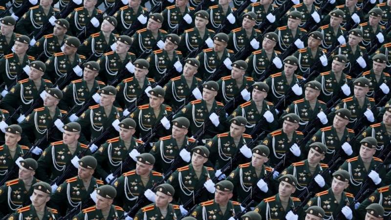 Putin signs decree to build up Russia’s armed forces