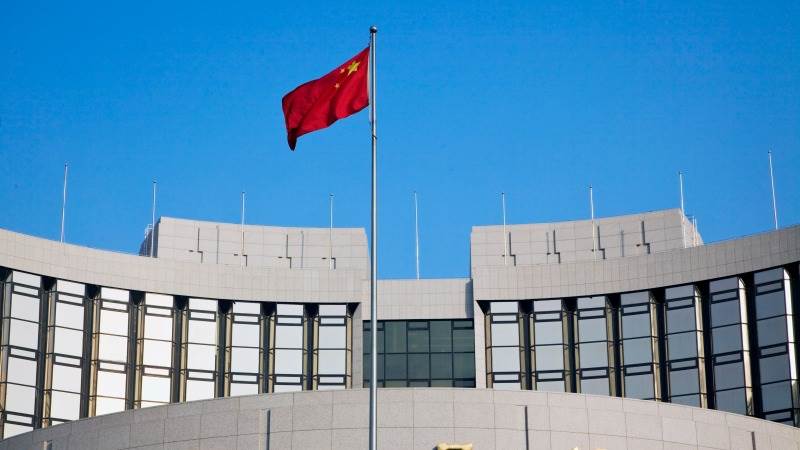 China’s central bank holds benchmark rates