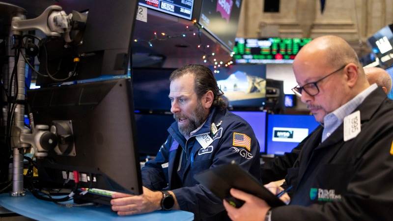 US opens lower amid new batch of data