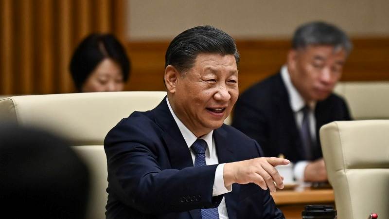 Xi urges international staff to defend national interests