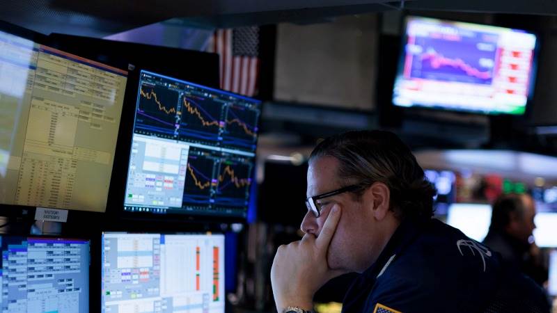 US closes mostly lower ahead of CPI data, earnings