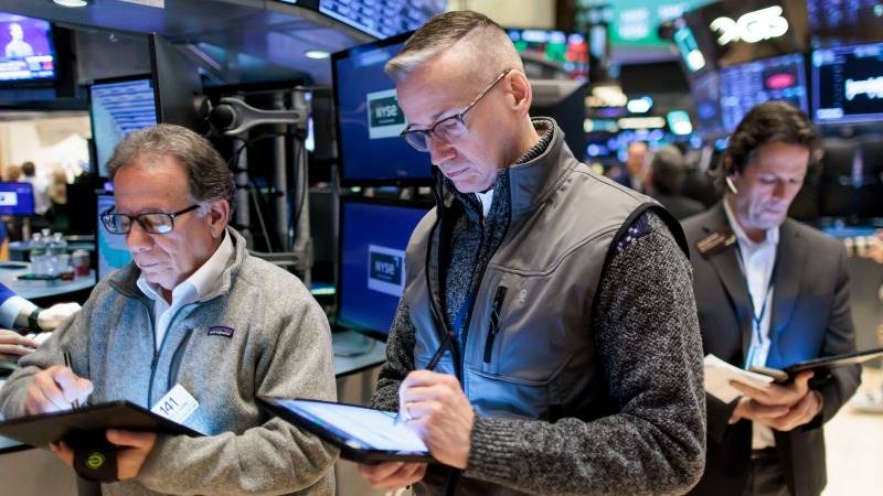 Wall Street opens higher as quarterly results pour in