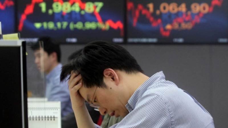 Asia-Pacific mostly lower after US inflation report